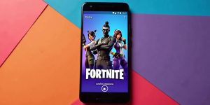 Android phone with Fortnite startup screen